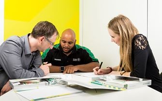 St John Ambulance course participants learning from course materials. St John Ambulance course participants learning from course materials.