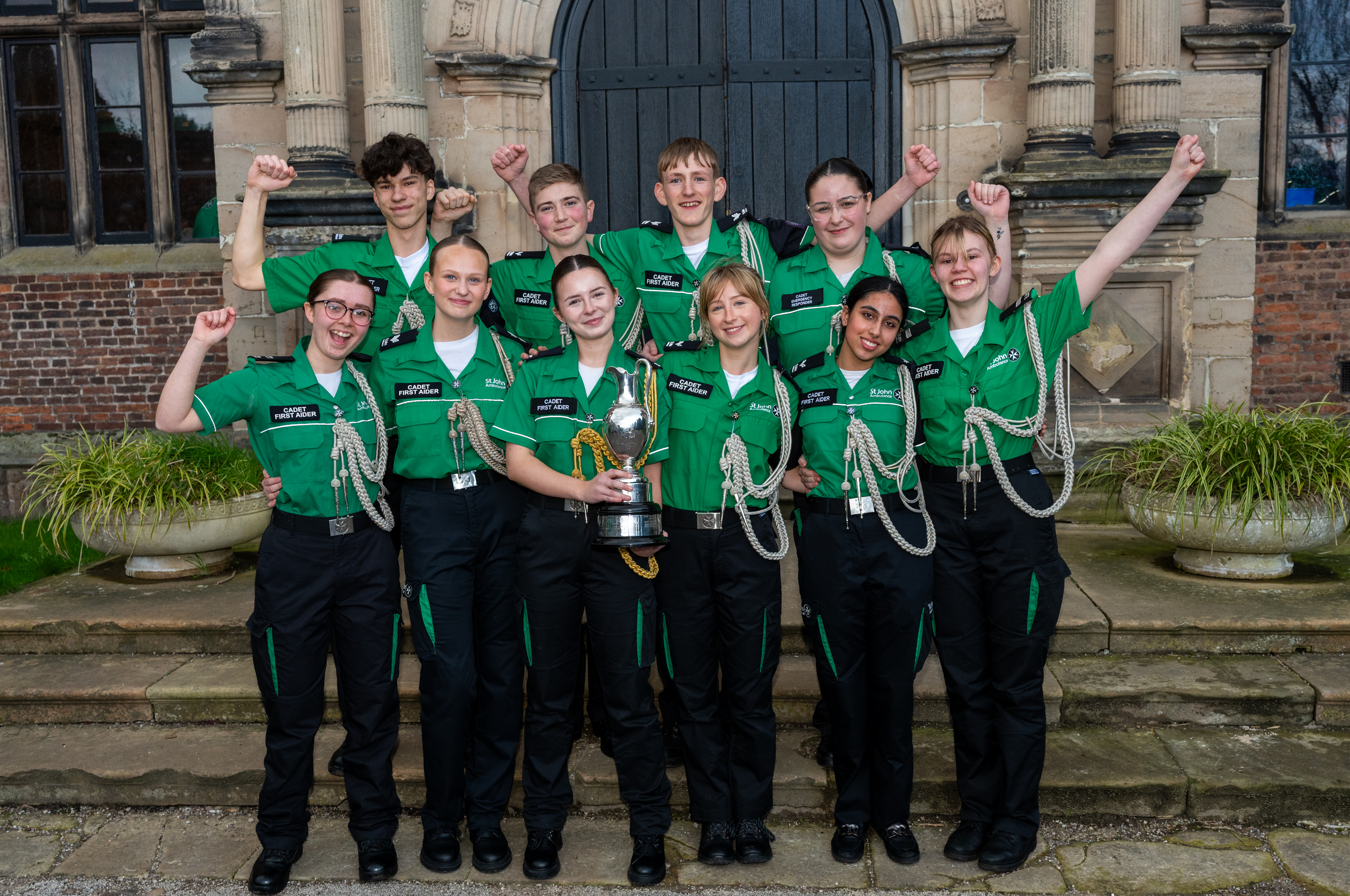 NCOTY AND RCOTYs hands up smiling outside - landscape.jpg