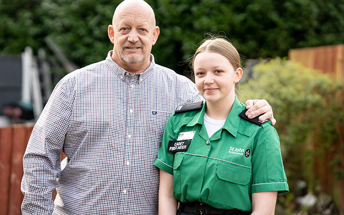 St John Ambulance cadet, Lillie Hulme standing together with her father Philip Hulme.