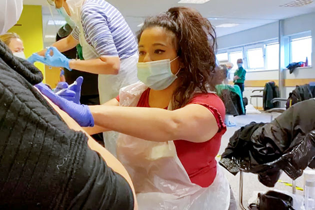 Vaccination volunteer receiving training