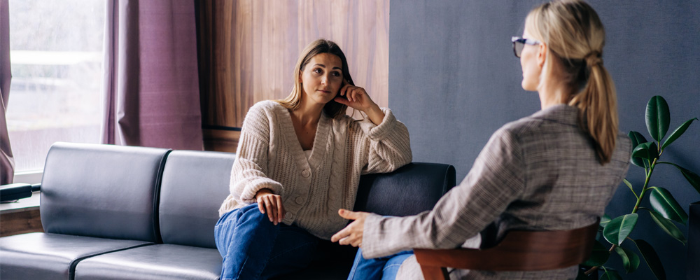 Two people having a heartfelt conversation.