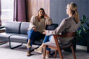 Two people having a heartfelt conversation.