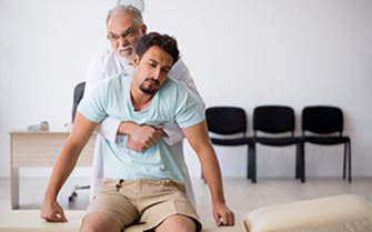A man helping a person in an emergency situation.