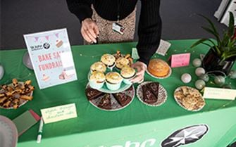 An arrangement of baked treats on a table of a St John Ambulance fundraiser. An arrangement of baked treats on a table of a St John Ambulance fundraiser.