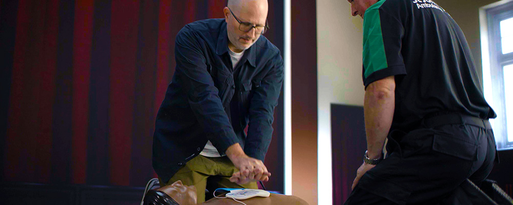 A man learning first aid skills.