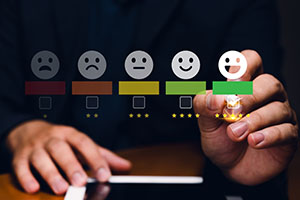 A representation of a person using their mobile device to select an option conveying complete satisfaction.