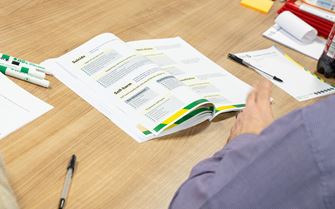 A mental health first aid student studying. A mental health first aid student studying.