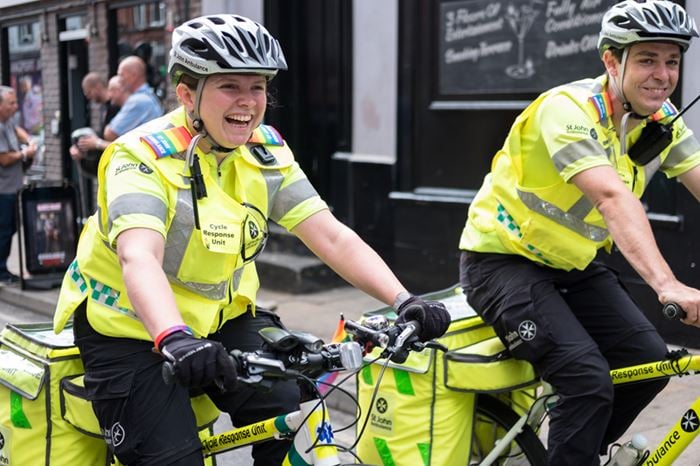 Two volunteers with the SJA cycle response unit at PRIDE festival