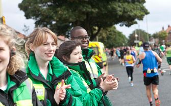 First Aiders cheering on runners