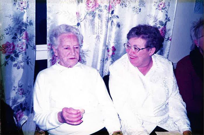 Eileen and Pauline sitting next to each other. 