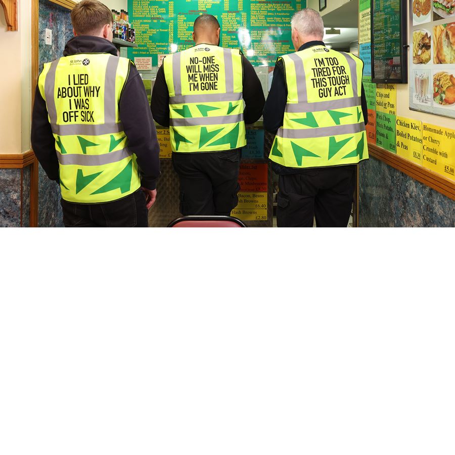 A group of construction workers at a cafe.